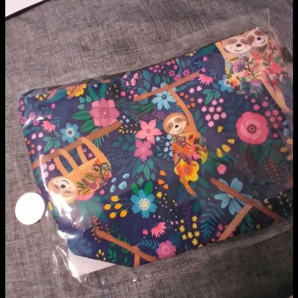 Sleepy sloth makeup or whatever pouch